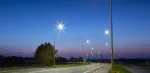 Night-time scene of a road lined with street lights