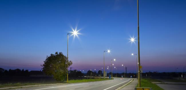 Night-time scene of a road lined with street lights
