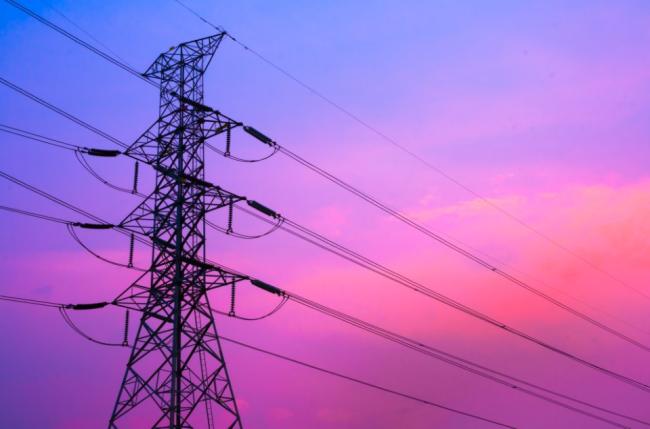Powerlines against a sunset