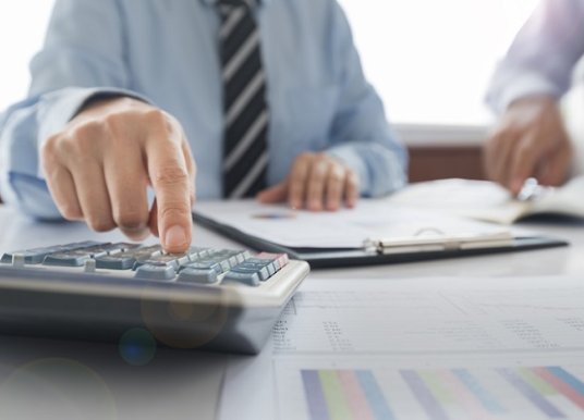 person using calculator